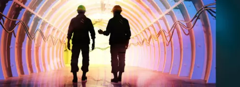 Silhouette of workers in the tunnels.