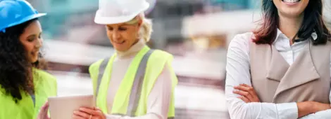Cropped portrait of a young female engineer with her colleagues on a construction site