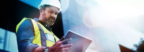 Shot of a engineer using a digital tablet on a construction site