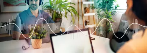 Male and female Caucasian podcasters recording an podcast from modern home studio