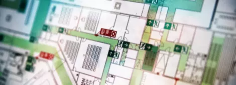 macro crop shot of evacuation plan with emergency exits