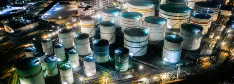 Storage tank of liquid chemical and petrochemical product tank, Aerial view at night.