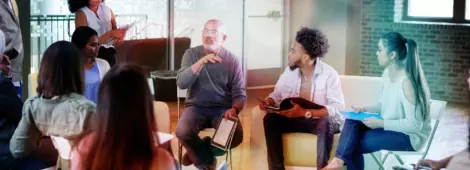 mature adult homeowner discusses the good and bad points of the plans for a  his neighborhood.