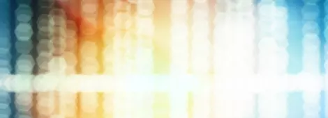 Colorful defocused sound wave lights background.