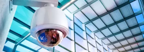 ecurity, CCTV camera for office building at night.