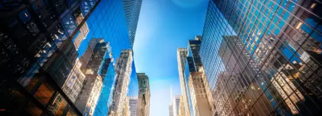 Futuristic skyscrapers in Midtown Manhattan on a sunny day.