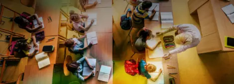 High angle view of large group of elementary students having a class in the classroom