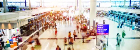 Crowd of people waiting for check-in.
