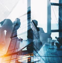 office workers abstract working inside of building, sun shinning through