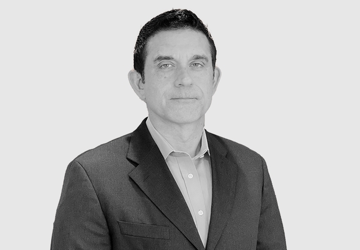 A headshot image of Craig Sylvester