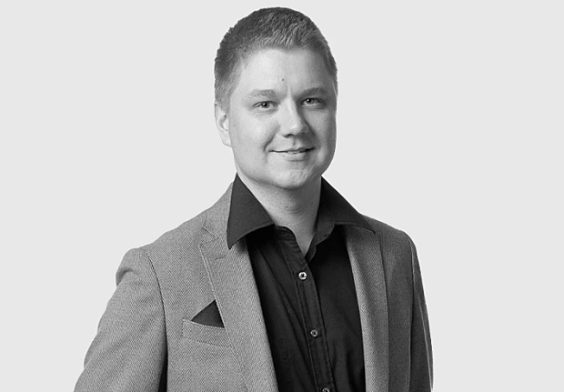 A headshot image of Timo Oikkonen