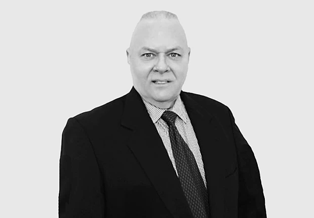 A headshot image of Eric Sutman