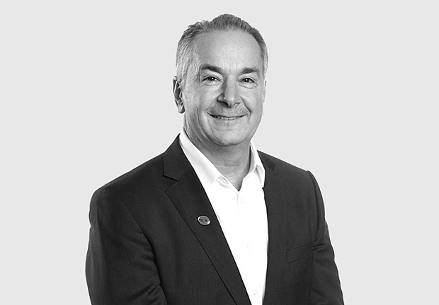 A headshot image of Eric Rosenbaum