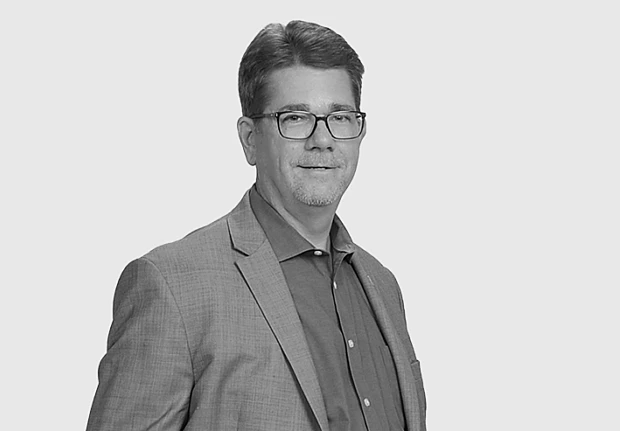 A headshot image of Roger Glick