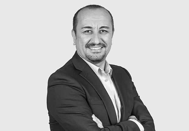 A headshot image of Kursat Kinali