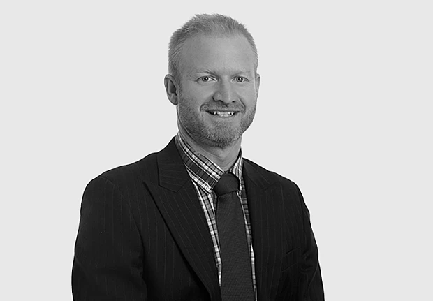 A headshot image of Warwick Hunter