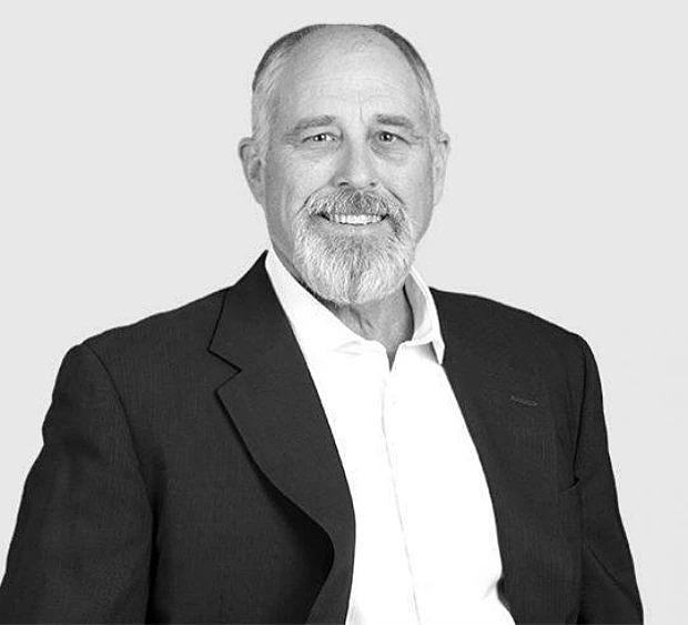 A headshot image of John Stone