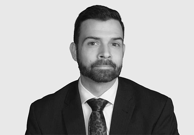 A headshot image of Matthew Icenroad