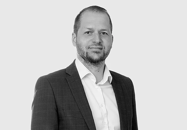 A headshot image of Mikko Salminen