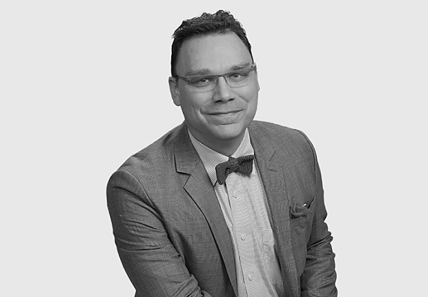 A headshot image of Joshua Klyber