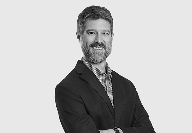 A headshot image of Walker Donuji