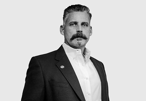 A headshot image of Vernon Champlin