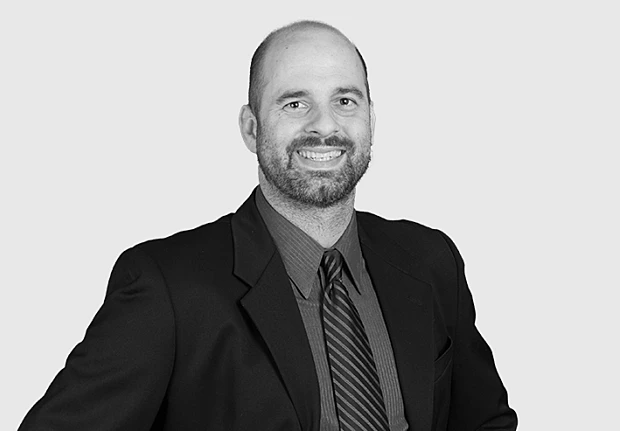 A headshot image of Benjamin Baumann