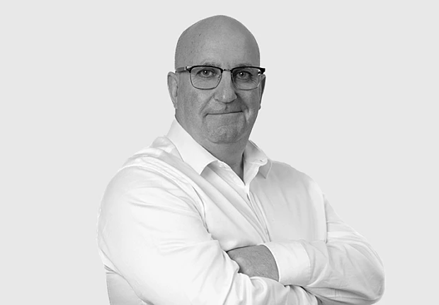 A headshot image of Mark Ross