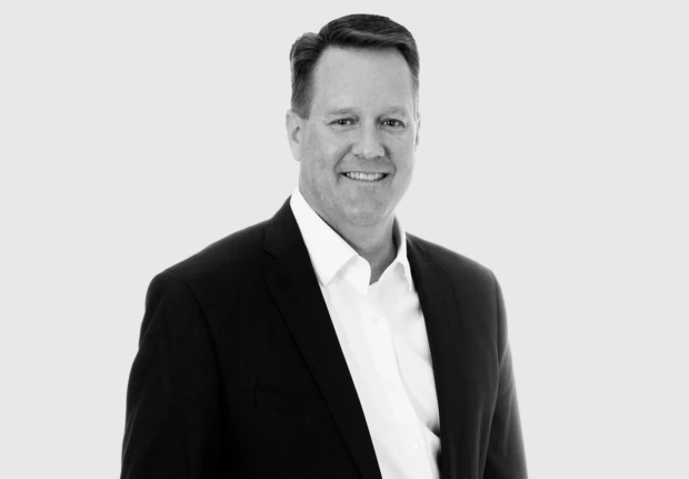 A headshot image of Chris Brown