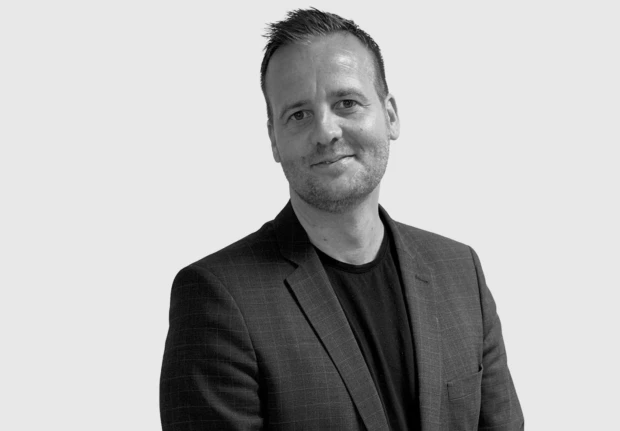 A headshot image of Allan Anton Hansen