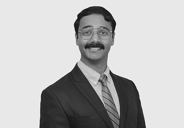 A headshot image of Arjun Sethi