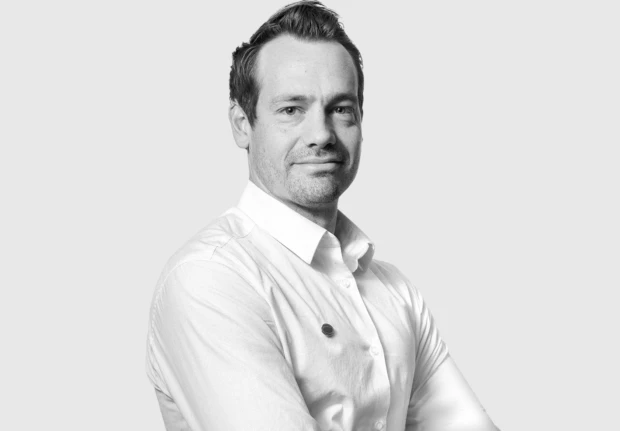 A headshot image of Evan O’Hanlon