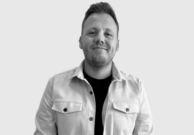 A headshot image of Lasse Riget Juul