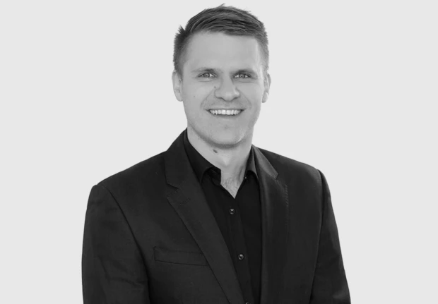 A headshot image of Zach Oliver