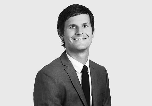 A headshot image of Alex Newberry