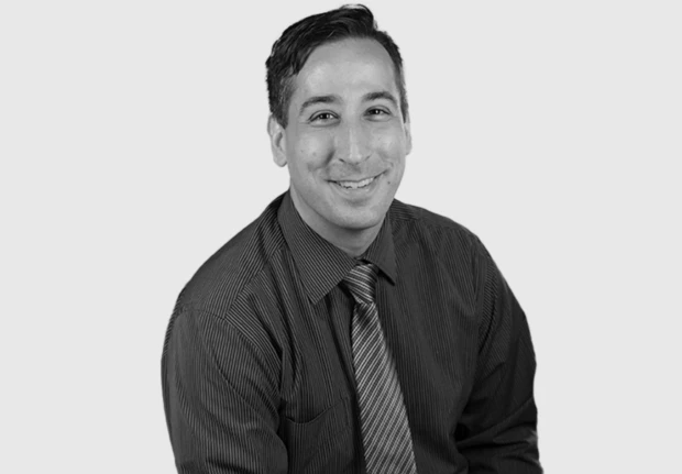 A headshot image of Dominic Esposito