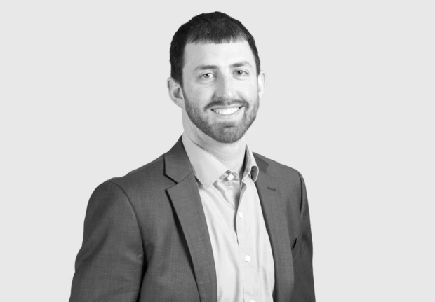 A headshot image of Eric Camiel