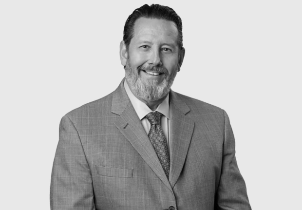 A headshot image of John Orloff