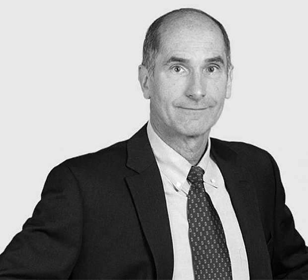 A headshot image of Dan Joyce