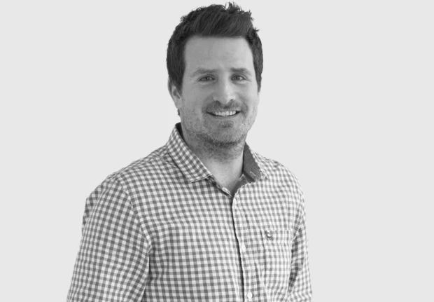 A headshot image of Evan Calitz