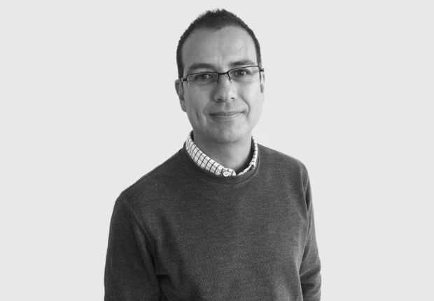 A headshot image of Eduardo Maciel