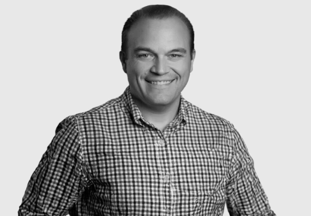 A headshot image of Ryan Bennett