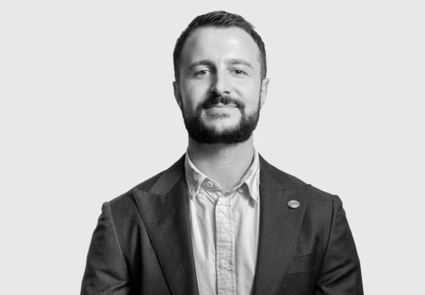 A headshot image of Andrew Stevens