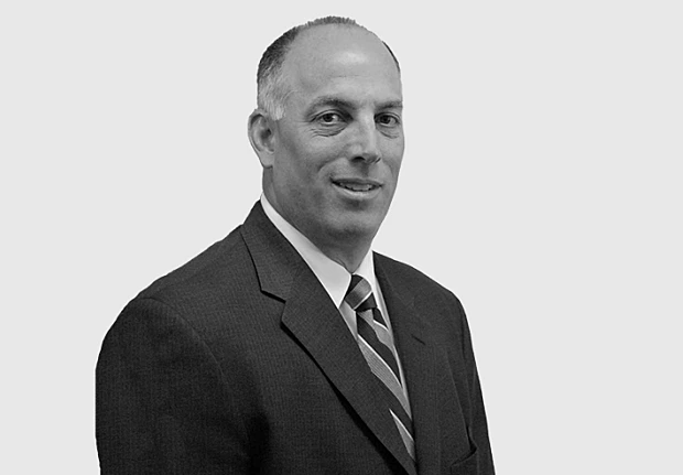 A headshot image of Jeffrey Chumbley