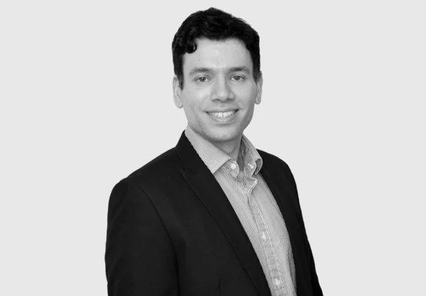 A headshot image of Ben Sharp