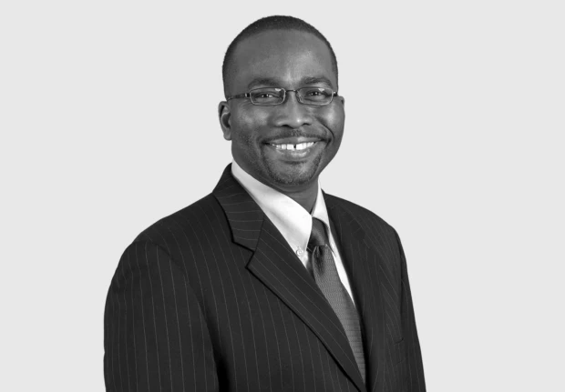 A headshot image of Alwin Kelly