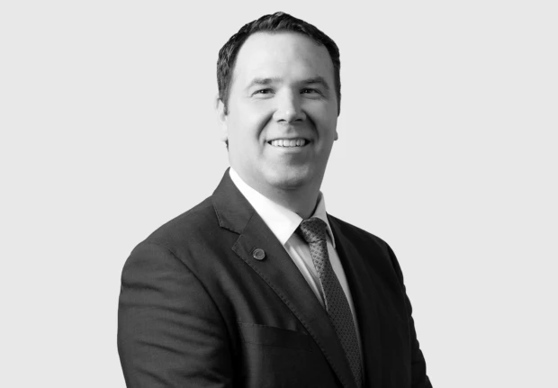 A headshot image of Aaron Vanney