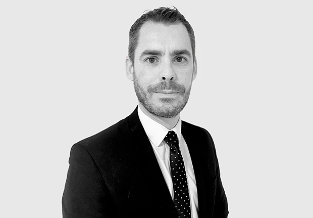 A headshot image of Tony McParland