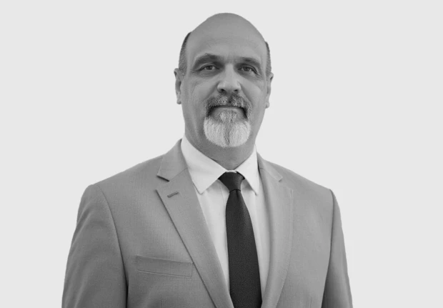 A headshot image of Matthew Harper