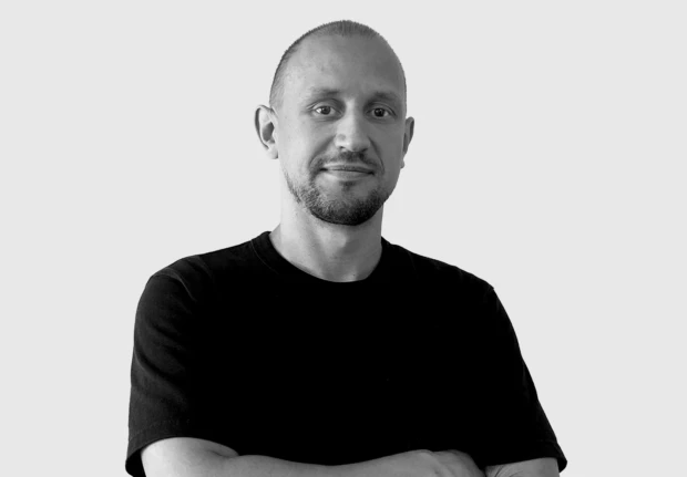 A headshot image of Justas Stanislovaitis